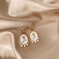 1 Pair Vintage Style Bow Knot Enamel Plating Inlay Alloy Artificial Pearls Gold Plated Drop Earrings sku image 2