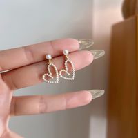 1 Pair Sweet Simple Style Heart Shape Plating Alloy Artificial Pearls Gold Plated Ear Cuffs Ear Studs main image 6