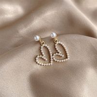 1 Pair Sweet Simple Style Heart Shape Plating Alloy Artificial Pearls Gold Plated Ear Cuffs Ear Studs main image 1