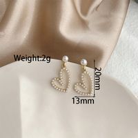 1 Pair Sweet Simple Style Heart Shape Plating Alloy Artificial Pearls Gold Plated Ear Cuffs Ear Studs sku image 1