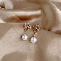 1 Pair Elegant Korean Style Flower Inlay Imitation Pearl Alloy Artificial Rhinestones Gold Plated Drop Earrings main image 1