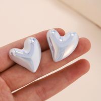 1 Pair Simple Style Heart Shape Stamping Resin Ear Studs main image 4
