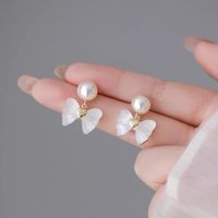 1 Paire Élégant Style Coréen Noeud D'arc Incruster Alliage Perles Artificielles Boucles D'oreilles main image 4