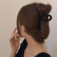 Simple Style Bow Knot Twist Imitation Pearl Cloth Hair Claws main image 3
