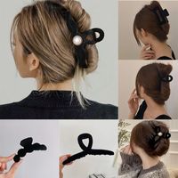 Simple Style Bow Knot Twist Imitation Pearl Cloth Hair Claws main image 1
