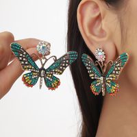 1 Pair Simple Style Classic Style Butterfly Plating Inlay Alloy Rhinestones Gold Plated Drop Earrings main image 1
