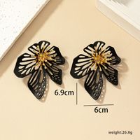 1 Pair Simple Style Flower Plating Hollow Out Metal Ear Studs main image 8