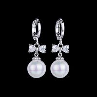 1 Pair Elegant Cute Simple Style Round Bow Knot Polishing Plating Inlay Copper Copper Alloy Artificial Pearls Zircon White Gold Plated Drop Earrings main image 3