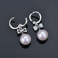 1 Pair Elegant Cute Simple Style Round Bow Knot Polishing Plating Inlay Copper Copper Alloy Artificial Pearls Zircon White Gold Plated Drop Earrings main image 5