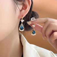 1 Pair Bohemian Simple Style Streetwear Water Droplets Inlay Copper Alloy Artificial Gemstones Drop Earrings main image 3