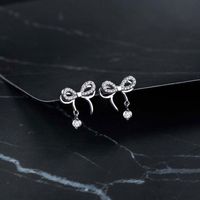 1 Paire Sucré Noeud D'arc Placage Incruster Argent Sterling Zircon Plaqué Or Boucles D'oreilles main image 1