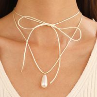 Simple Style Bow Knot Pu Leather Imitation Pearl Patchwork Women's Pendant Necklace main image 1