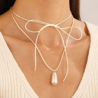 Simple Style Bow Knot Pu Leather Imitation Pearl Patchwork Women's Pendant Necklace main image 3