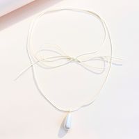Simple Style Bow Knot Pu Leather Imitation Pearl Patchwork Women's Pendant Necklace main image 4