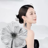 1 Pair Simple Style Commute Bamboo Flower Printing Polishing Arylic Silver Plated Drop Earrings main image 3