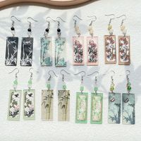 1 Pair Simple Style Commute Bamboo Flower Printing Polishing Arylic Silver Plated Drop Earrings main image 1
