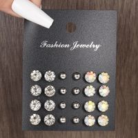 Wholesale Jewelry Simple Style Classic Style Solid Color Alloy Rhinestones Inlay Ear Studs main image 1