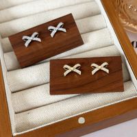 1 Pair Simple Style Bow Knot Copper Ear Studs main image 1