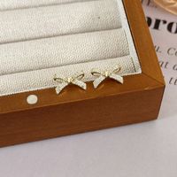 1 Pair Simple Style Bow Knot Copper Ear Studs main image 4