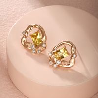 1 Pair Simple Style Irregular Rectangle Plating Hollow Out Inlay Alloy Copper Alloy Artificial Gemstones 18k Gold Plated Ear Studs main image 7