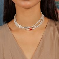 Simple Style Classic Style Heart Shape Artificial Pearl Zinc Alloy Beaded Women's Layered Necklaces main image 5