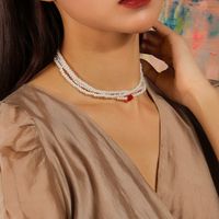Simple Style Classic Style Heart Shape Artificial Pearl Zinc Alloy Beaded Women's Layered Necklaces main image 4