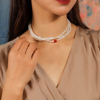 Einfacher Stil Klassischer Stil Herzform Künstliche Perle Zinklegierung Perlen Frau Geschichtete Halskette main image 3