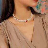 Simple Style Classic Style Heart Shape Artificial Pearl Zinc Alloy Beaded Women's Layered Necklaces main image 1