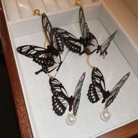 1 Pair Elegant Sweet Butterfly Inlay Arylic Artificial Pearls Drop Earrings sku image 1
