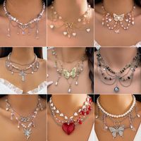 Wholesale Jewelry Y2K Sweet Star Butterfly Alloy Turquoise Iron Beaded Knitting Enamel Layered Necklaces main image video
