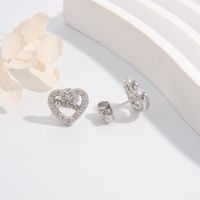 1 Pair Simple Style Letter Heart Shape Plating Hollow Out Inlay Sterling Silver Zircon White Gold Plated Rhodium Plated Ear Studs main image 4