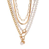 Retro French Style Sweet Irregular Round Imitation Pearl Alloy Copper Toggle Layered Tassel Women's Necklace main image 4