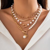 Retro French Style Sweet Irregular Round Imitation Pearl Alloy Copper Toggle Layered Tassel Women's Necklace main image 5