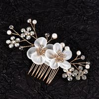 Women's Simple Style Classic Style Solid Color Alloy Inlay Rhinestones Pearl Hair Combs main image 3