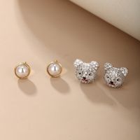 1 Pair Cute Xuping Simple Style Round Bear Plating Inlay Copper Alloy Artificial Pearls Artificial Diamond 14k Gold Plated White Gold Plated Ear Studs main image 1