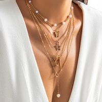French Style Sweet Classic Style Star Heart Shape Butterfly Imitation Pearl Alloy Copper Women's Necklace main image 1