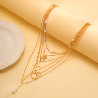 French Style Sweet Classic Style Star Heart Shape Butterfly Imitation Pearl Alloy Copper Women's Necklace main image 4