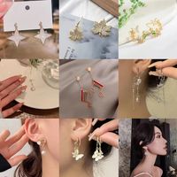 1 Pair Simple Style Shiny Maple Leaf Heart Shape Butterfly Plating Hollow Out Inlay Alloy Rhinestones Pearl 14k Gold Plated Drop Earrings main image 1