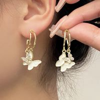 1 Pair Simple Style Shiny Maple Leaf Heart Shape Butterfly Plating Hollow Out Inlay Alloy Rhinestones Pearl 14k Gold Plated Drop Earrings main image 9