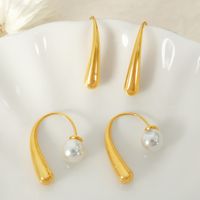 1 Pair Elegant Simple Style Commute Curve Plating Three-dimensional Inlay Titanium Steel Artificial Pearls 18k Gold Plated Ear Studs main image 4