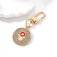 Vintage Style Simple Style Classic Style Round Devil's Eye Palm Alloy Inlay Rhinestones Bag Pendant Keychain sku image 1