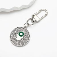 Vintage Style Simple Style Classic Style Round Devil's Eye Palm Alloy Inlay Rhinestones Bag Pendant Keychain main image 5