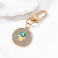 Vintage Style Simple Style Classic Style Round Devil's Eye Palm Alloy Inlay Rhinestones Bag Pendant Keychain sku image 5