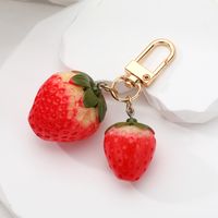 Casual Cute Simple Style Strawberry Bell Alloy Resin Bag Pendant Keychain main image 4