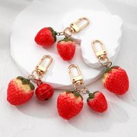 Casual Cute Simple Style Strawberry Bell Alloy Resin Bag Pendant Keychain main image 1