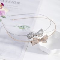 Women's Simple Style Bow Knot Metal Plating Inlay Rhinestones Hair Band main image 1