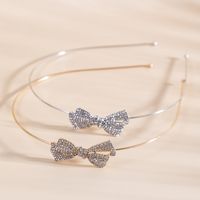 Women's Simple Style Bow Knot Metal Plating Inlay Rhinestones Hair Band main image 3