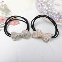 Women's Sweet Bow Knot Rhinestone Plating Inlay Artificial Pearls Hair Tie main image 1