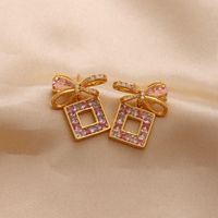 1 Pair Ig Style Luxurious Shiny Heart Shape Rose Bow Knot Plating Inlay Artificial Gemstones Copper Zircon 18k Gold Plated Ear Studs main image 6