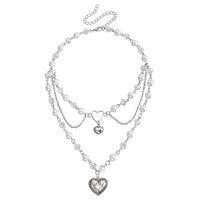 Einfacher Stil Kreuzen Legierung Perlen Frau Geschichtete Halskette sku image 9